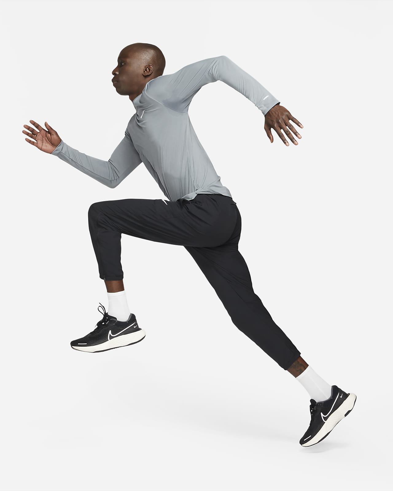 Nike Dri-FIT UV Challenger Men s Woven Hybrid Running Pants 