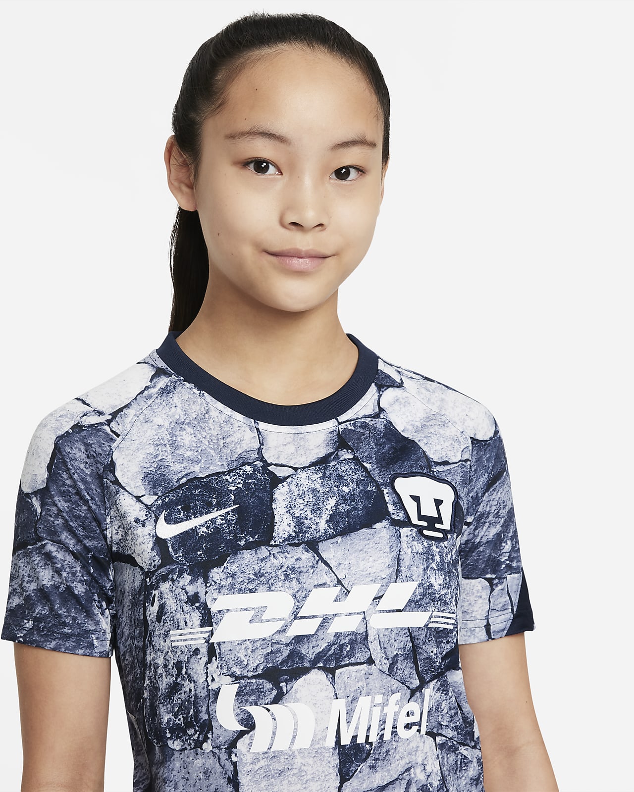 Playera de fútbol para antes del partido Nike Dri-FIT para niños talla  grande Pumas UNAM. Nike MX