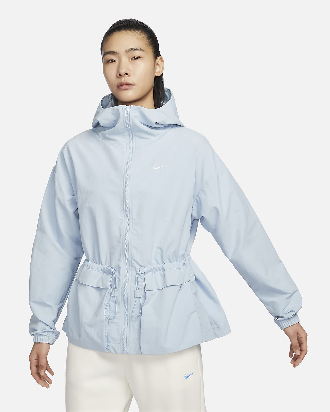 Nike Sportswear Everything 梭織女款寬版連帽外套。Nike TW