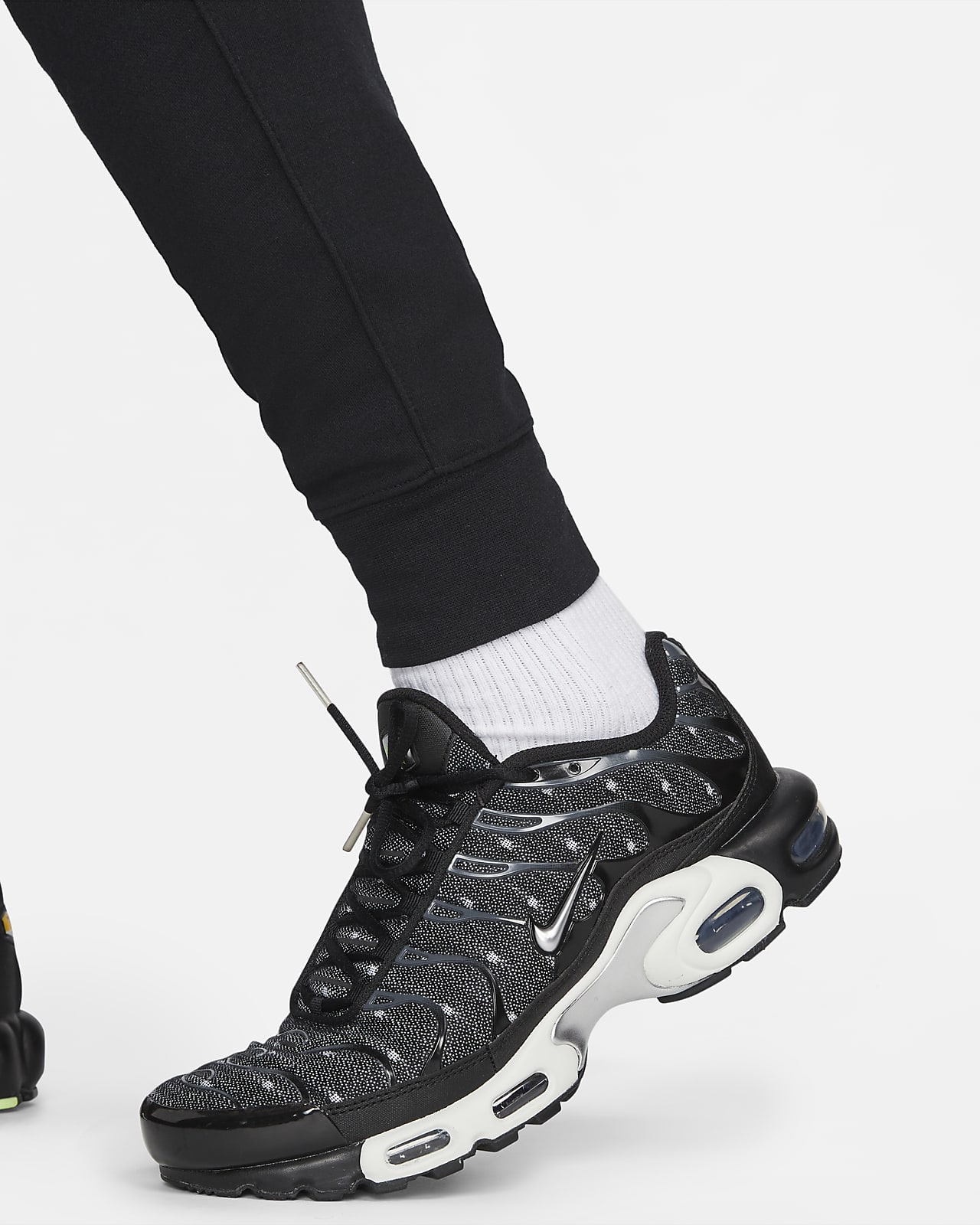 Pantaloni jogger in fleece con grafica Nike Sportswear - Uomo. Nike IT