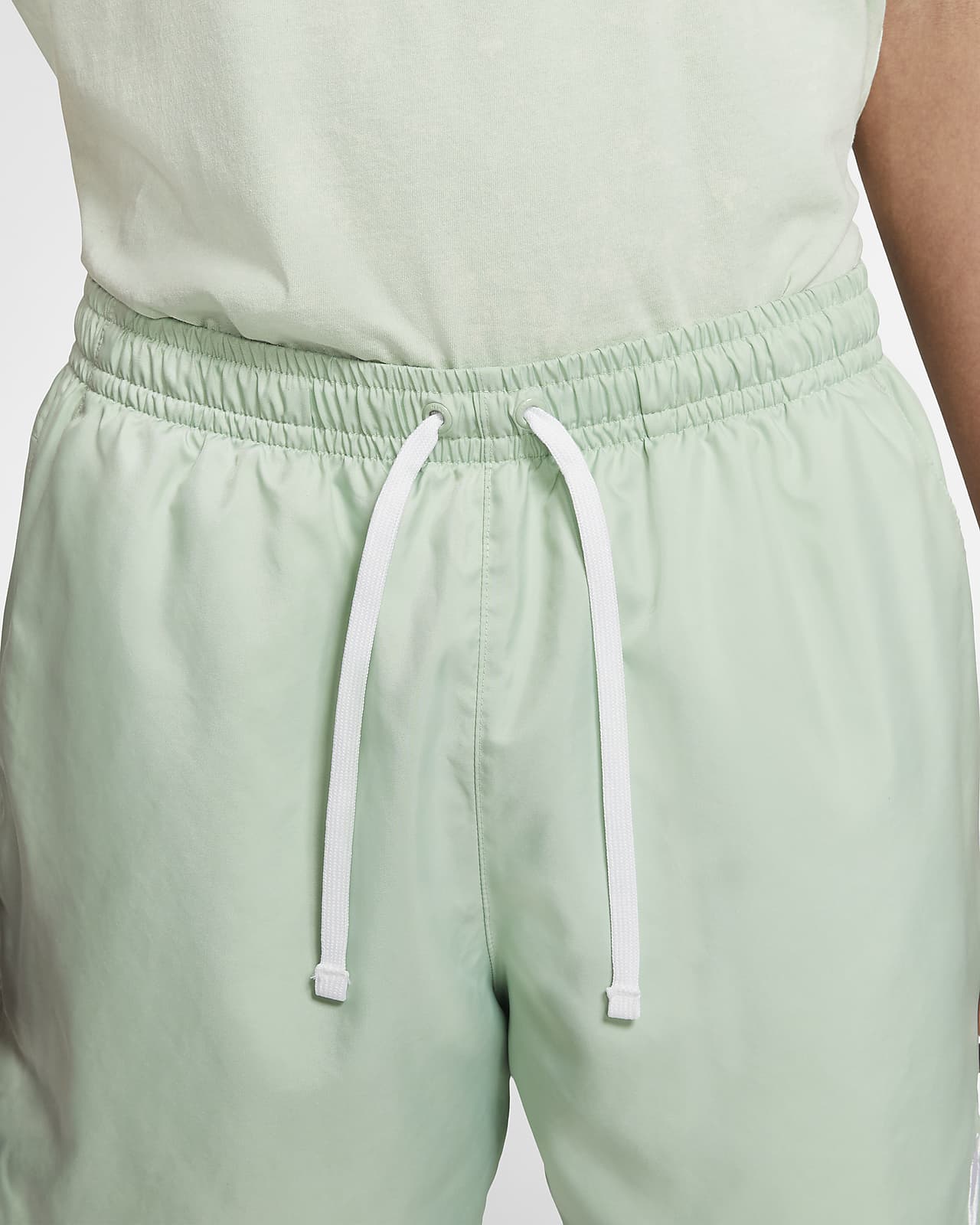 nike woven shorts green