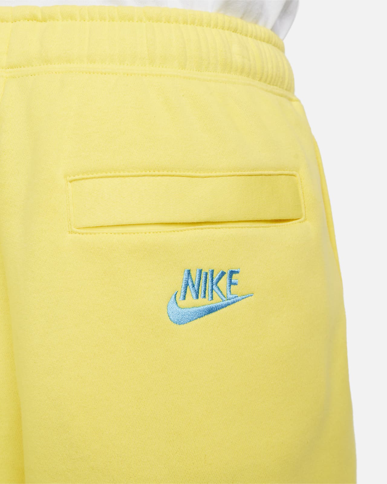 yellow nike fleece shorts