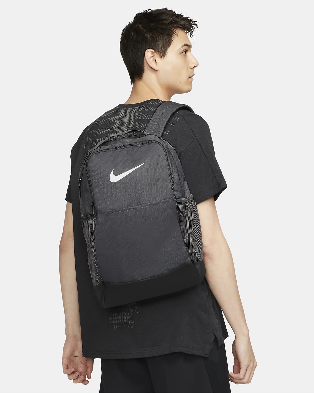 Nike Brasilia 9.5 Medium Backpack Navy Grab your gear and get going with  the Nike Brasilia Backpack. It has plenty of pockets to help you stay  organized including a sleeve to fit