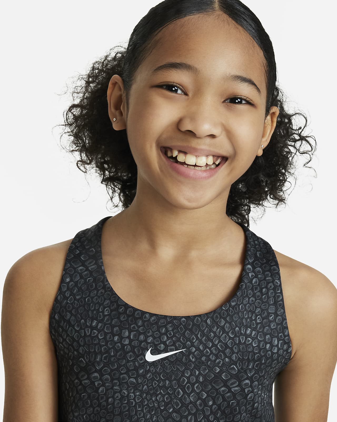 Nike Swoosh Older Kids' (Girls') Dri-FIT Tank Top Sports Bra. Nike IE