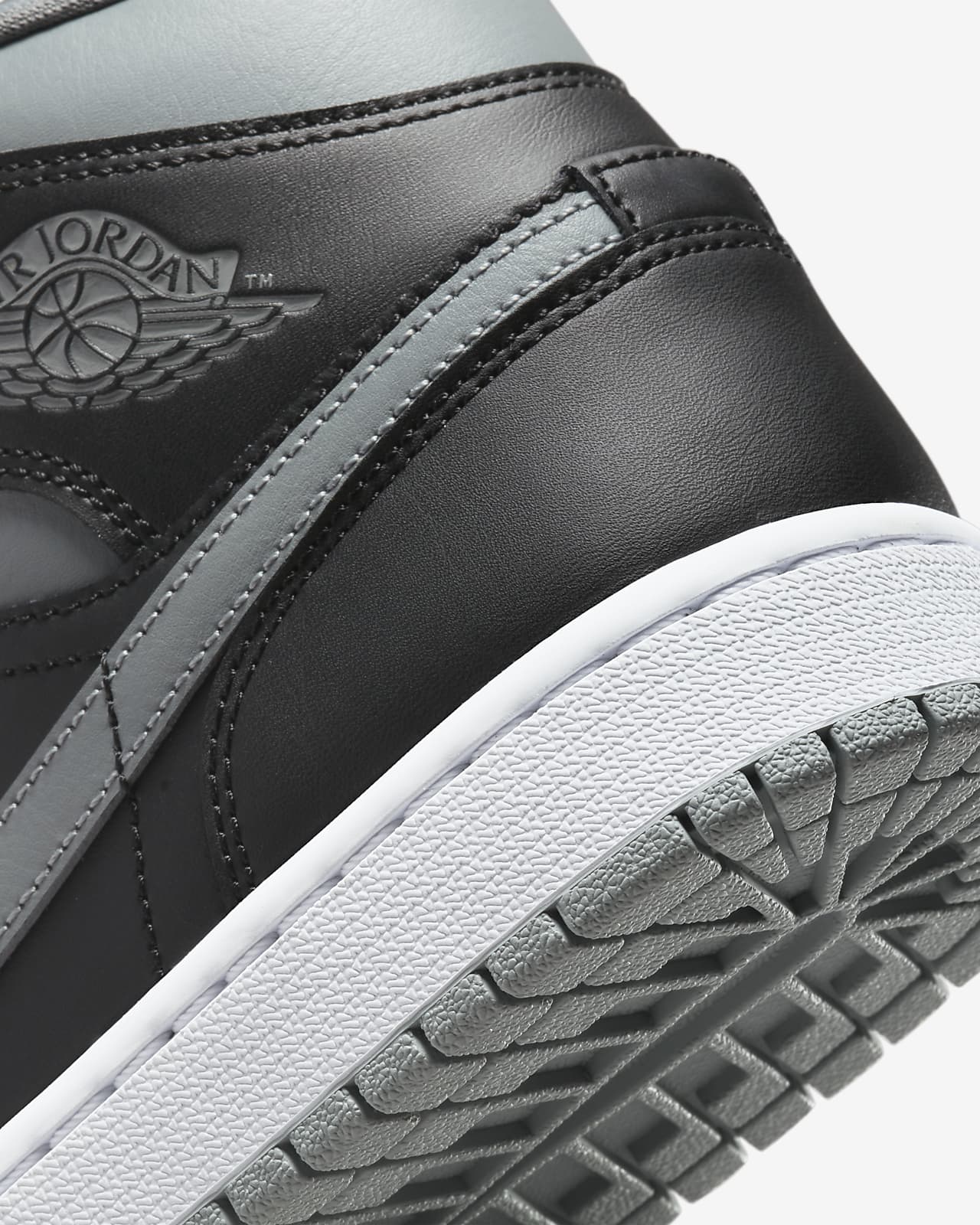 jordan 1 mid black women's shoe