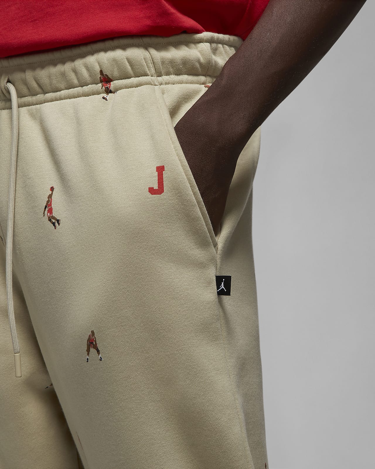 Jordan Essentials Men's Holiday French Terry Trousers. Nike AE