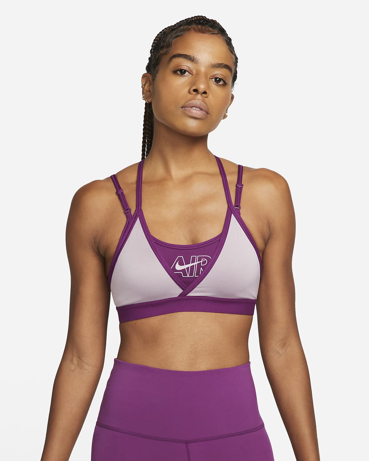 Nike Air Dri-FIT Indy Sujetador deportivo de sujeción ligera con  almohadilla y tirantes - Mujer. Nike ES