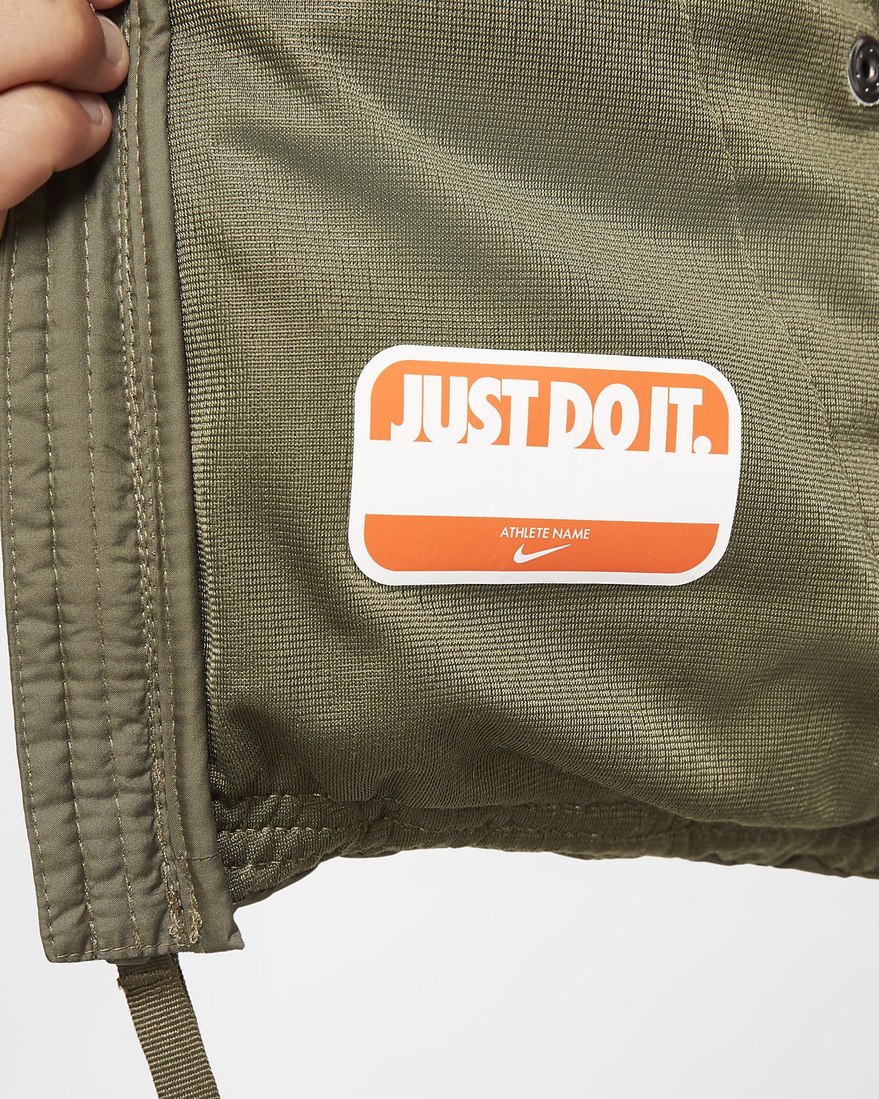 nike jacket that turns into a bag