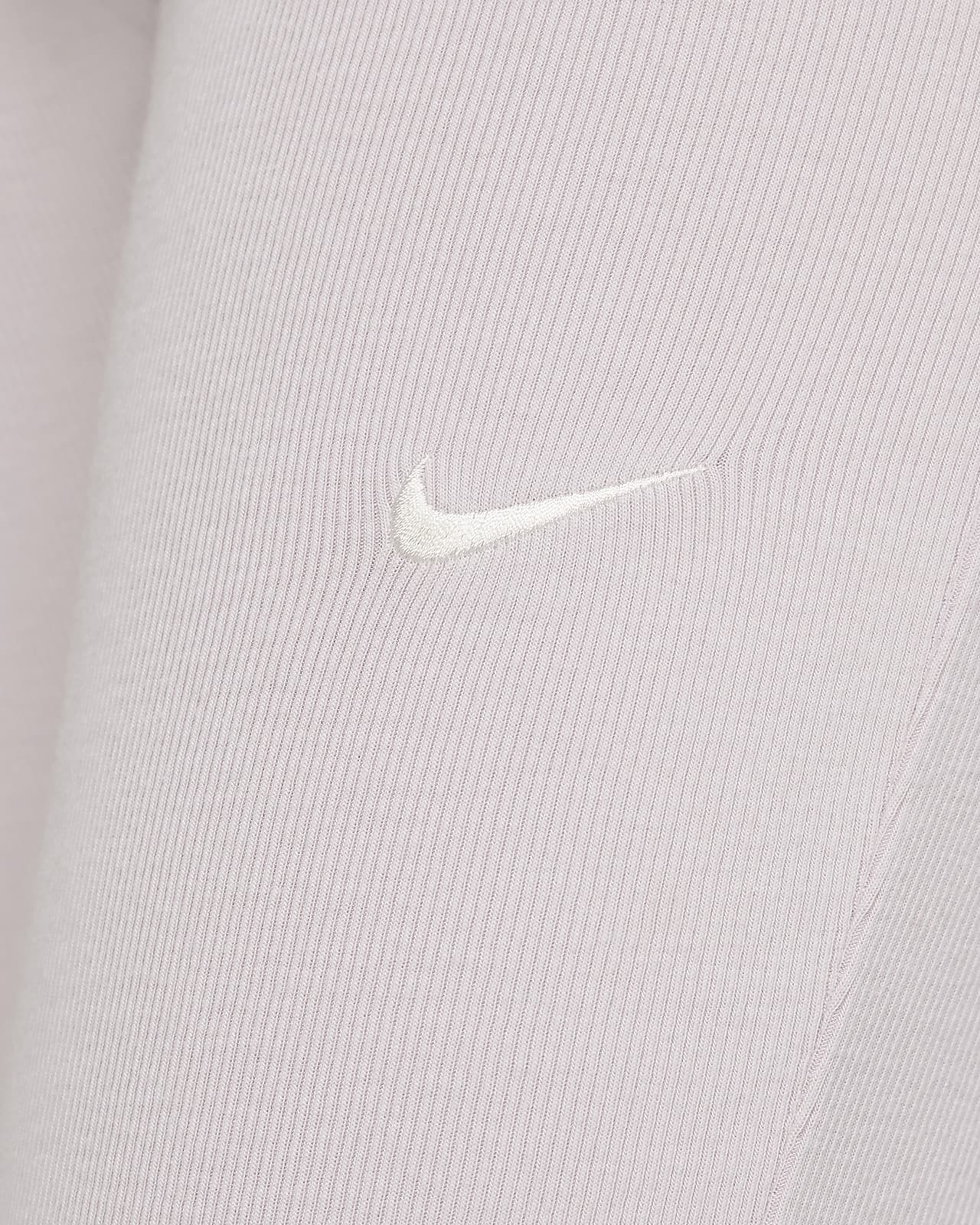 Leggings acampanados de tela de minicanalé ajustados para mujer Nike  Sportswear Chill Knit.
