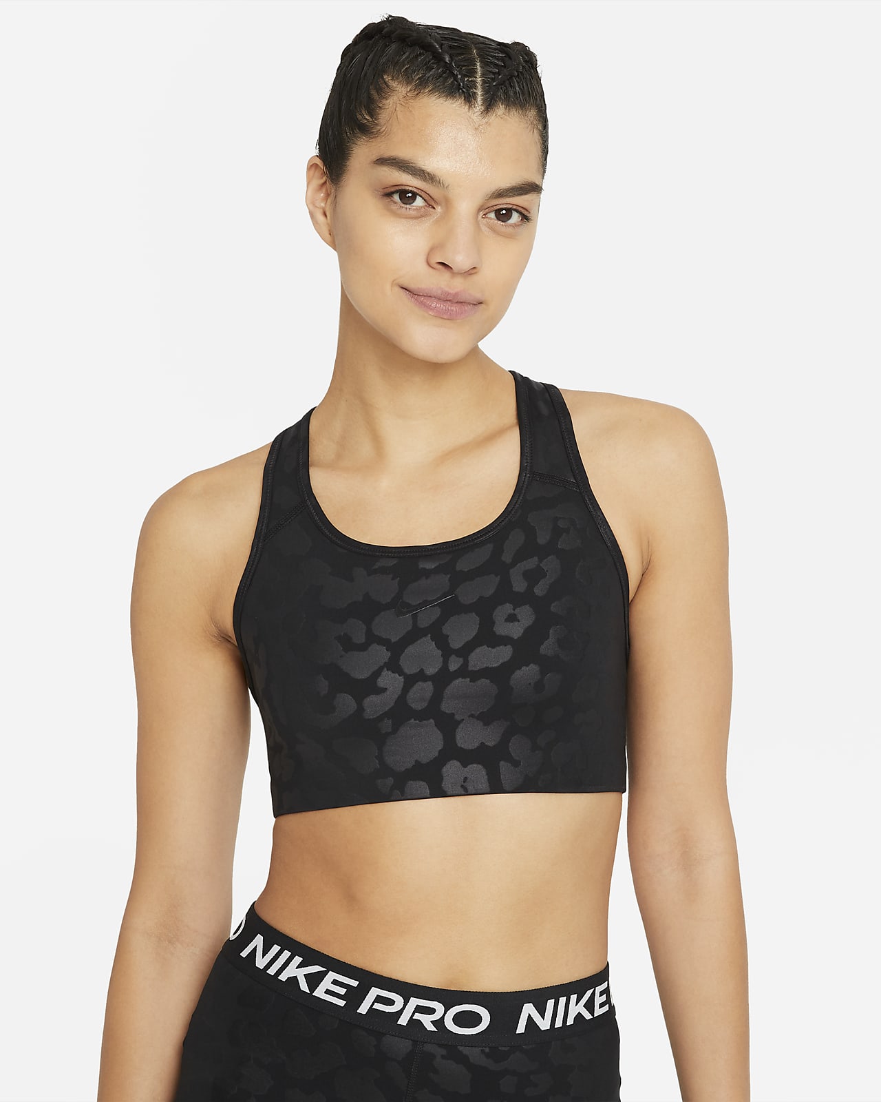 Nike Dri-FIT Swoosh Sport-bh met luipaardprint, medium ondersteuning. Nike  BE