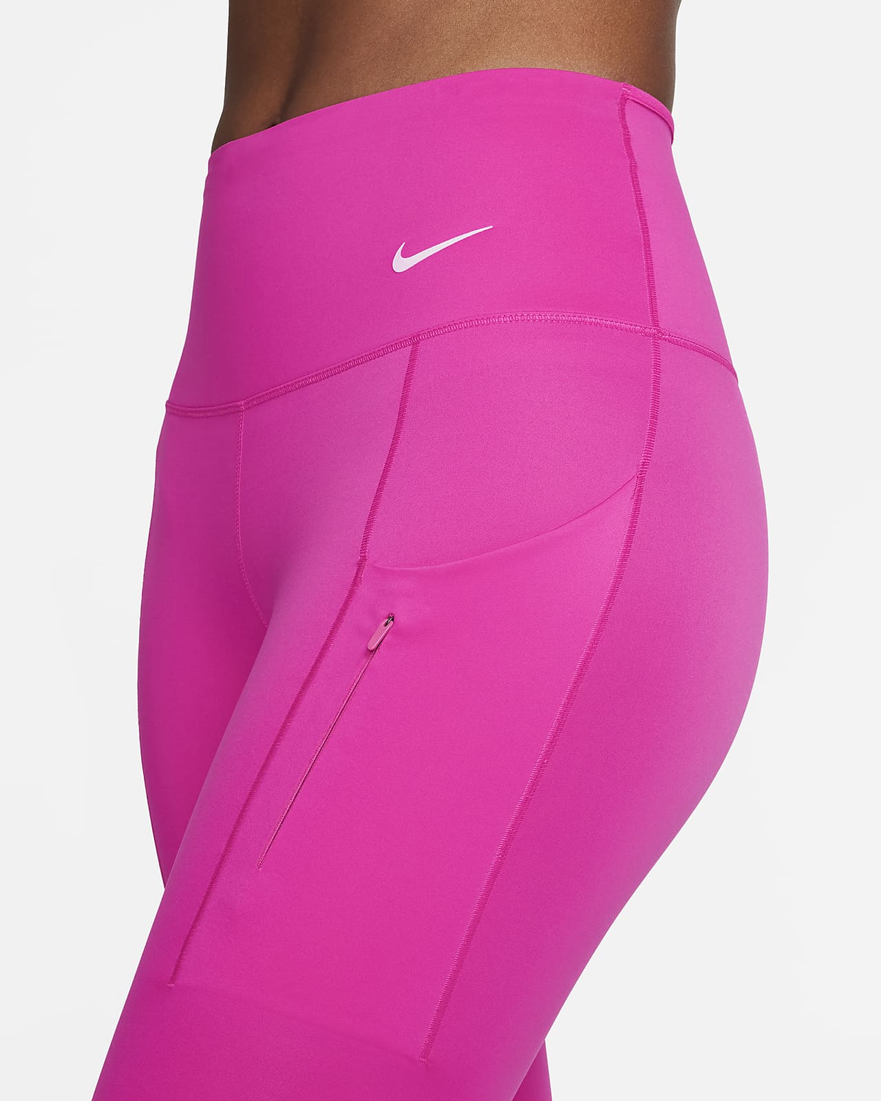 Damskie legginsy 7/8 z wysokim stanem i kieszeniami zapewniające mocne  wsparcie Nike Go. Nike PL