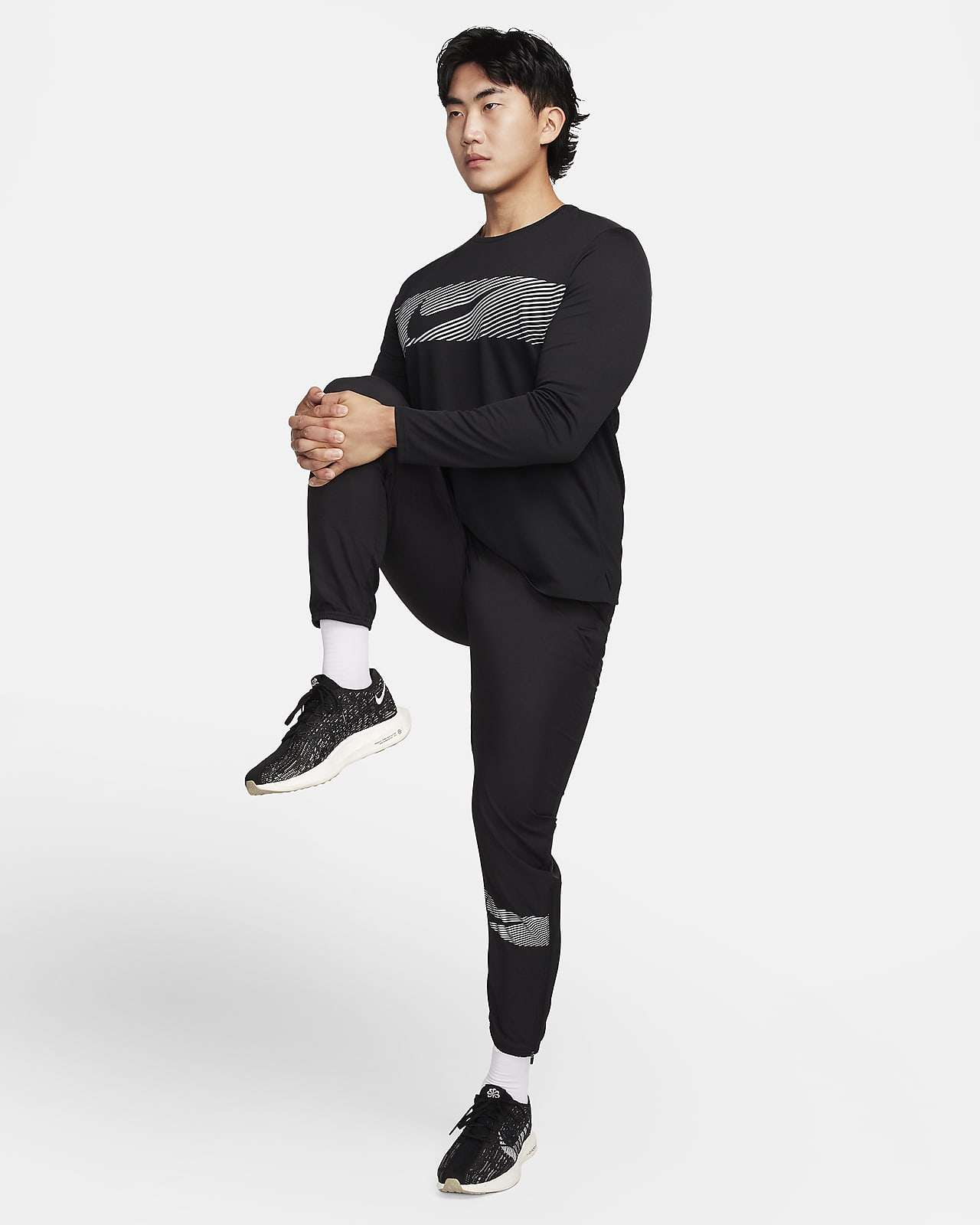 Nike Running Dri-FIT Run Division Challenger Flash woven pants in black