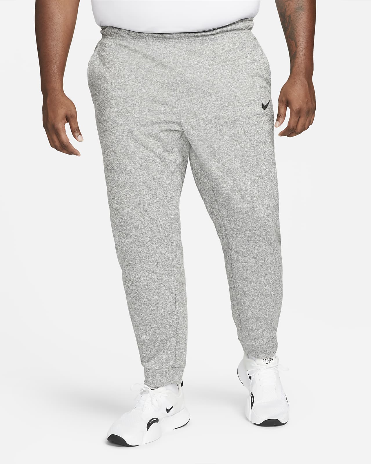 Nike Therma-FIT Men's Tapered Training Trousers. Nike NL