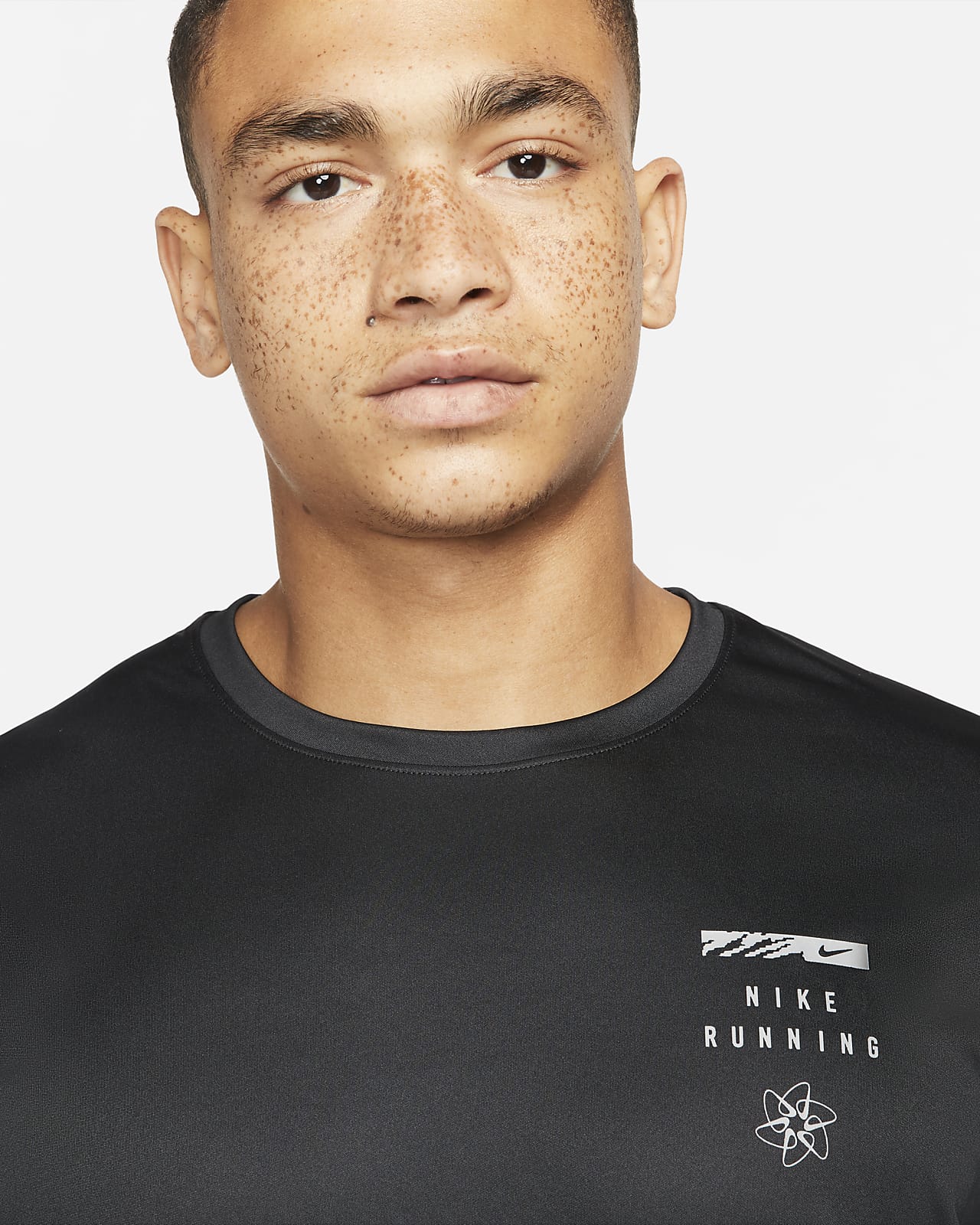 Nike Dri-FIT UV Run Division Miler Men's Graphic Short-Sleeve Top. Nike AT
