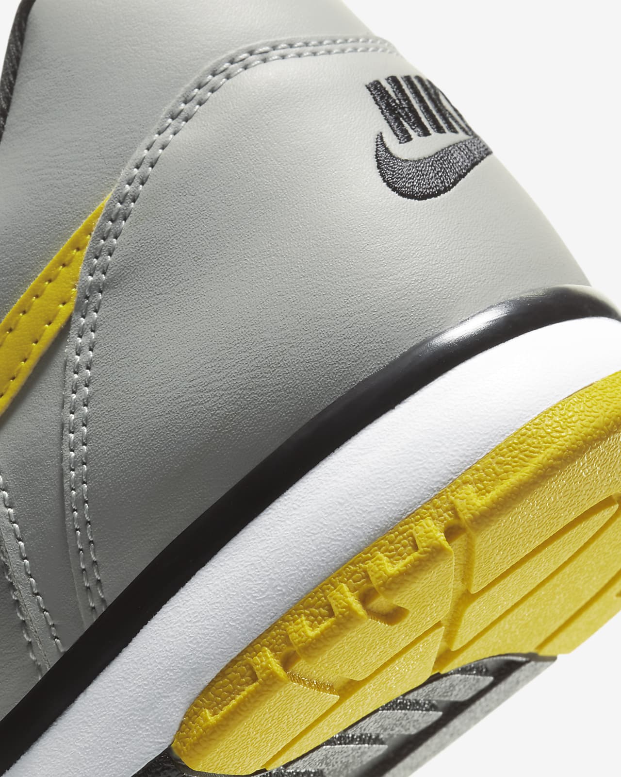 nike grey and yellow trainers