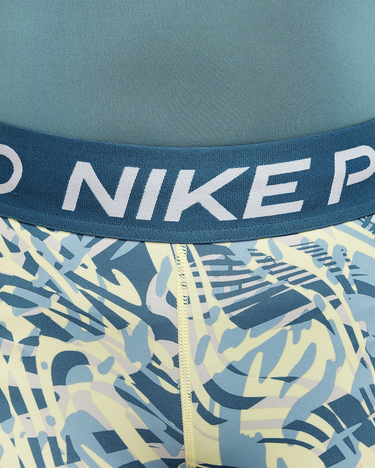 nike pro shorts teal