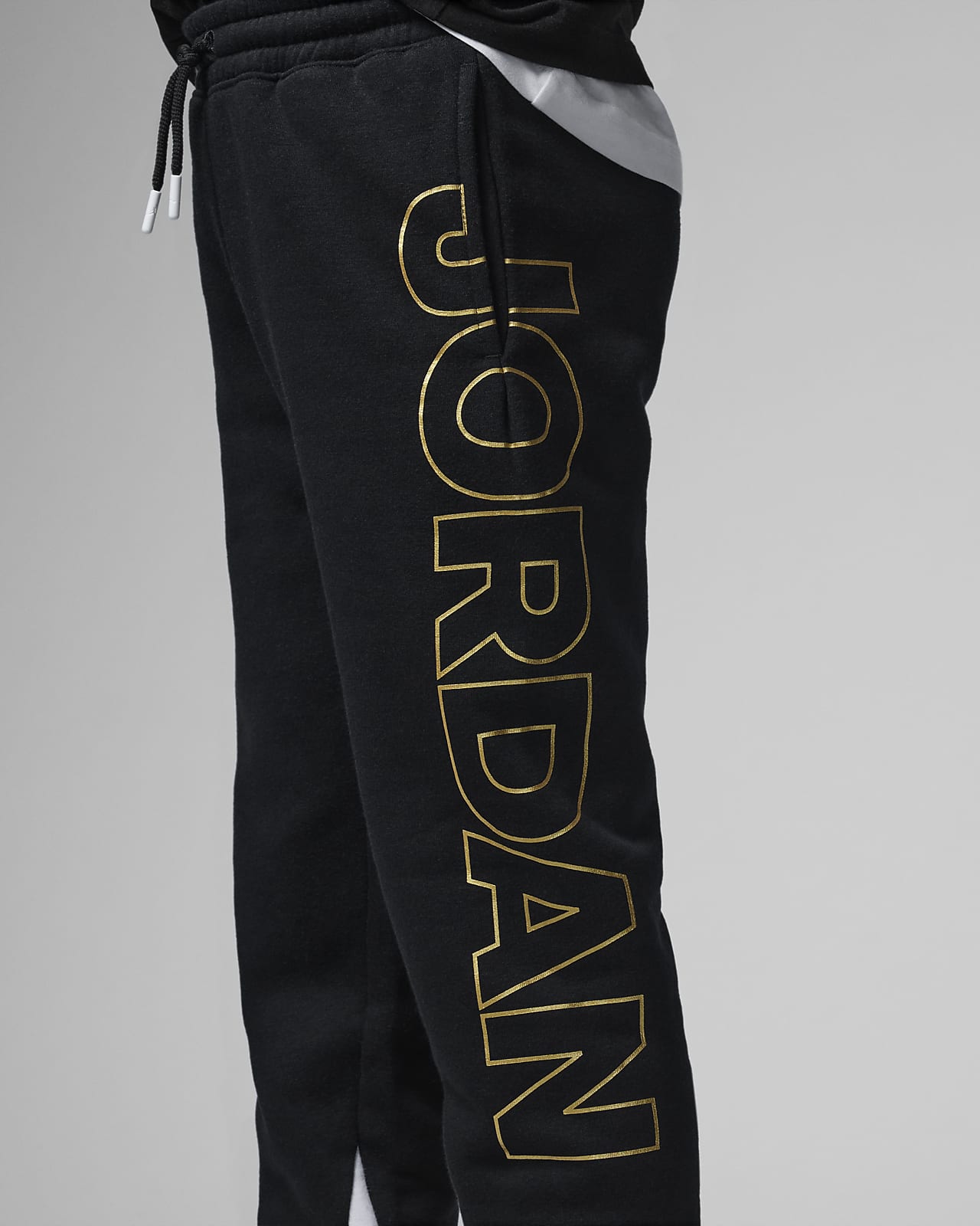 black and gold jordan pants