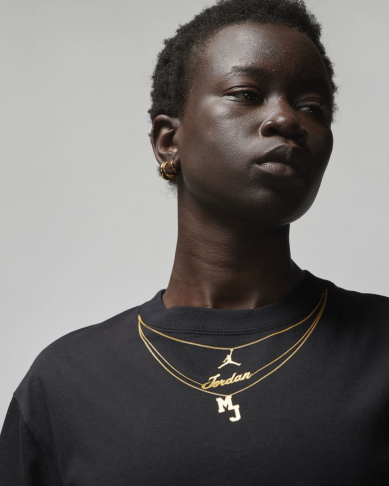 Playera con cadena oro para mujer Jordan (Her)itage. Nike MX