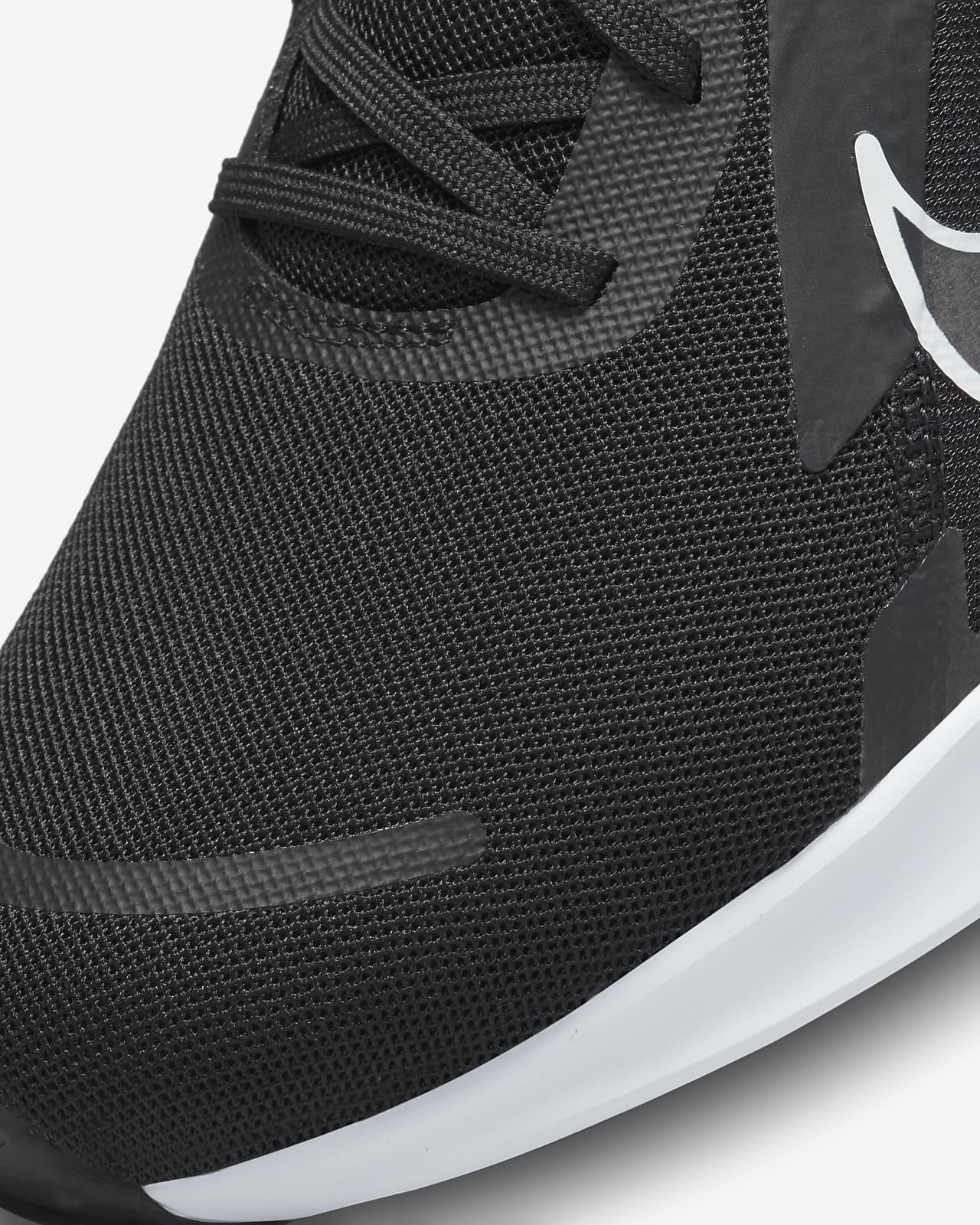nike running quest trainers in black & white