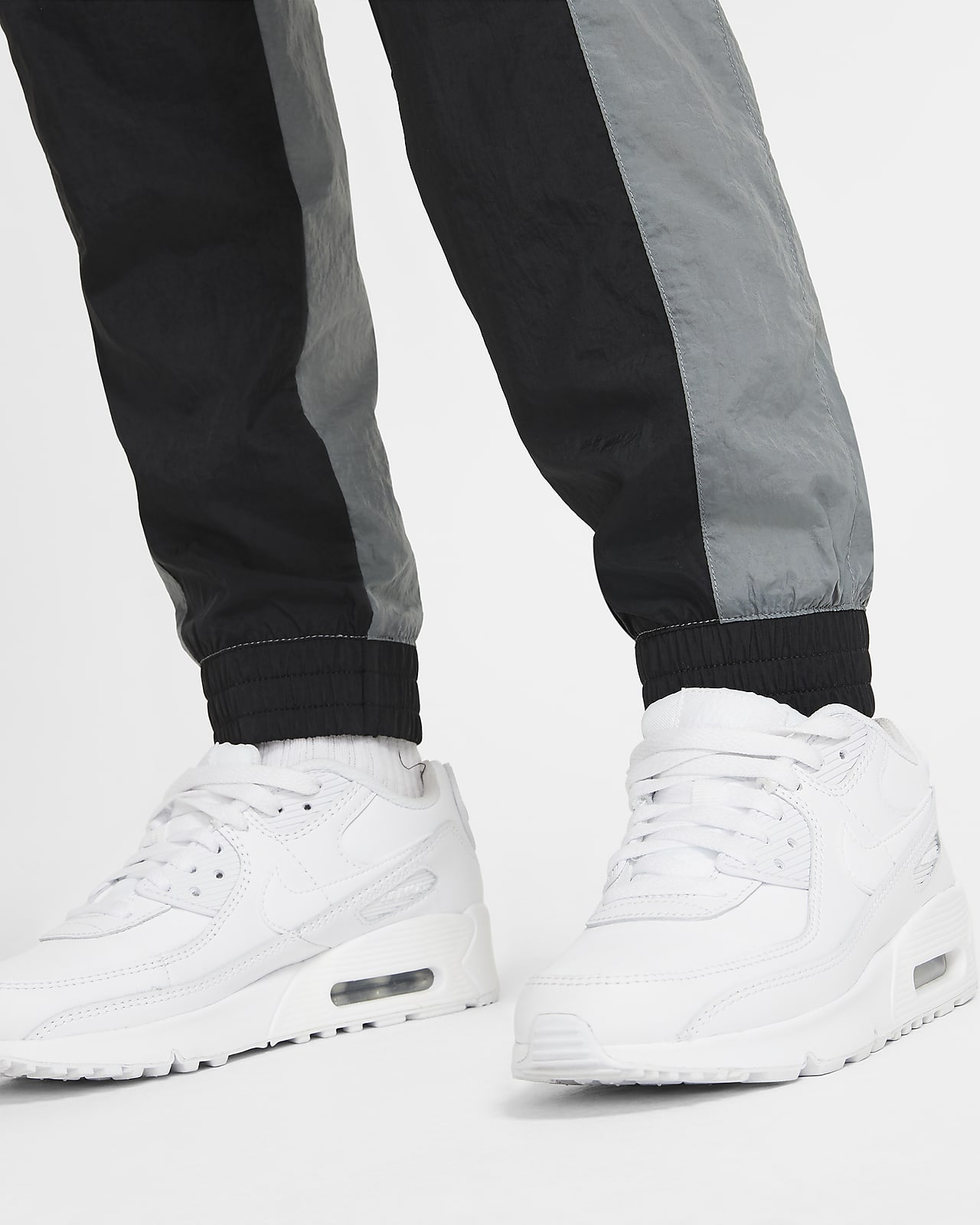 nike woven tracksuit black and white