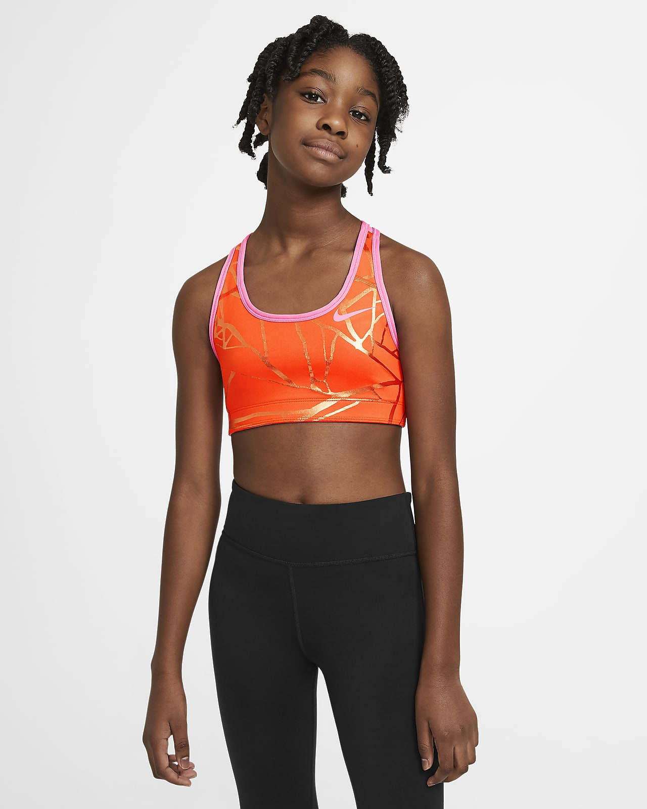 Nike Dri-FIT Swoosh Big Kids' (Girls') Reversible Printed Sports Bra.