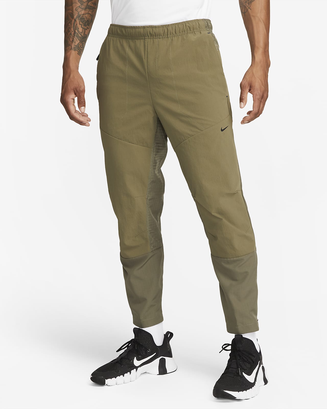 Nike A.P.S. Men's Dri-FIT ADV Woven Versatile Pants.