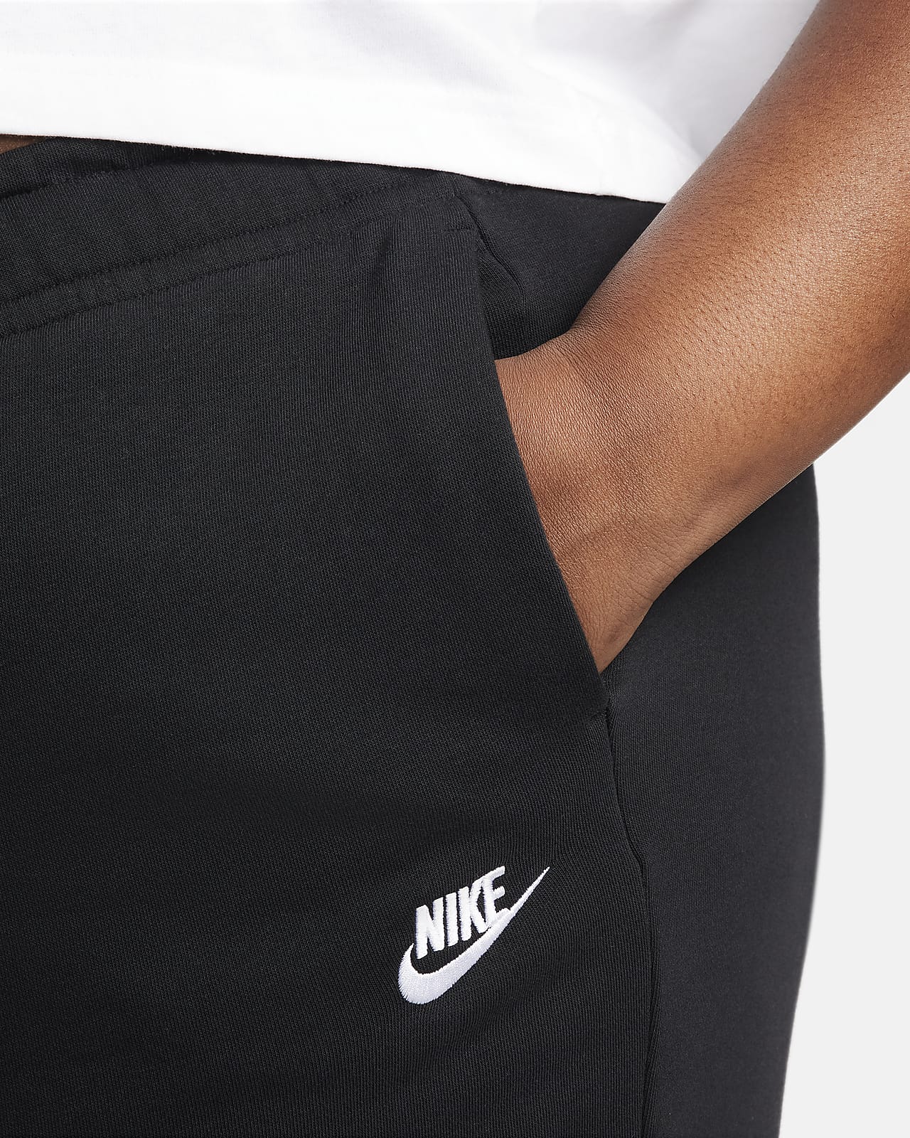 Pants de entrenamiento de tiro medio de pierna ancha para mujer (talla  grande) Nike Sportswear Club Fleece