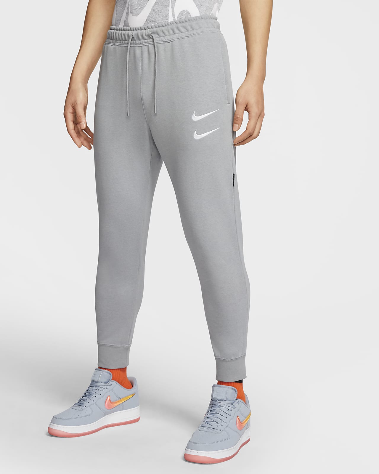 pantaloni nike uomo arancione