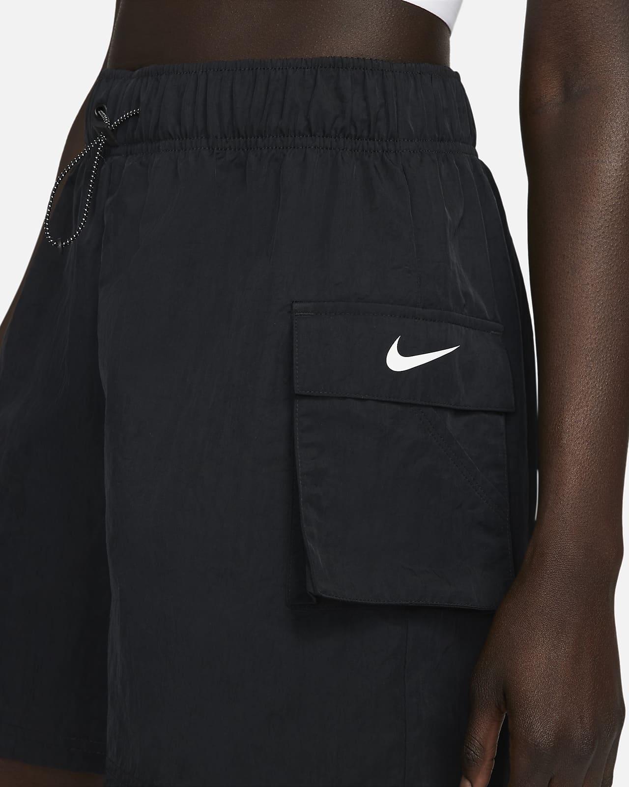 America Alas Margaret Mitchell Nike Sportswear Essential Pantalón corto de talle alto de tejido Woven -  Mujer. Nike ES