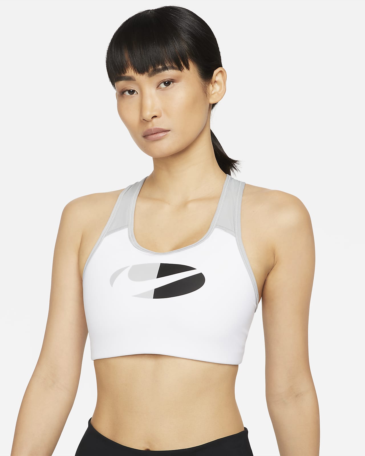 Nike Dri-FIT Swoosh Sport-bh met kleurblokken, medium ondersteuning en pad uit één stuk
