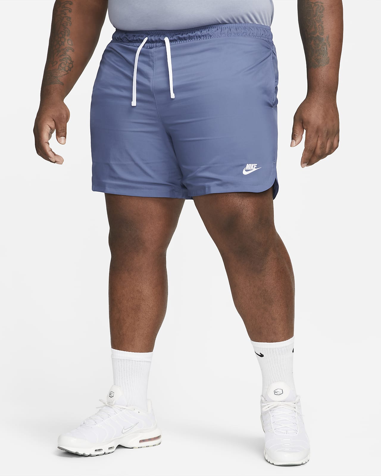 Nike Men's Sportswear Sport Essentials Woven Lined Flow Orange Shorts -  Hibbett