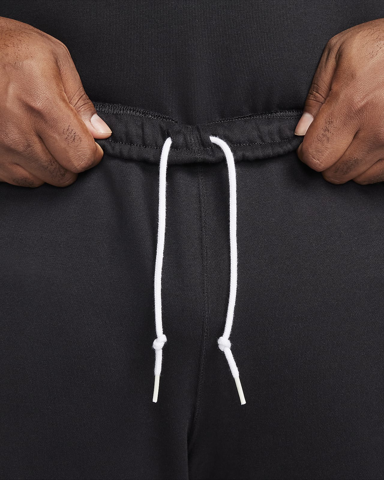 Pants de tejido Fleece con dobladillo abierto para hombre Nike Solo Swoosh