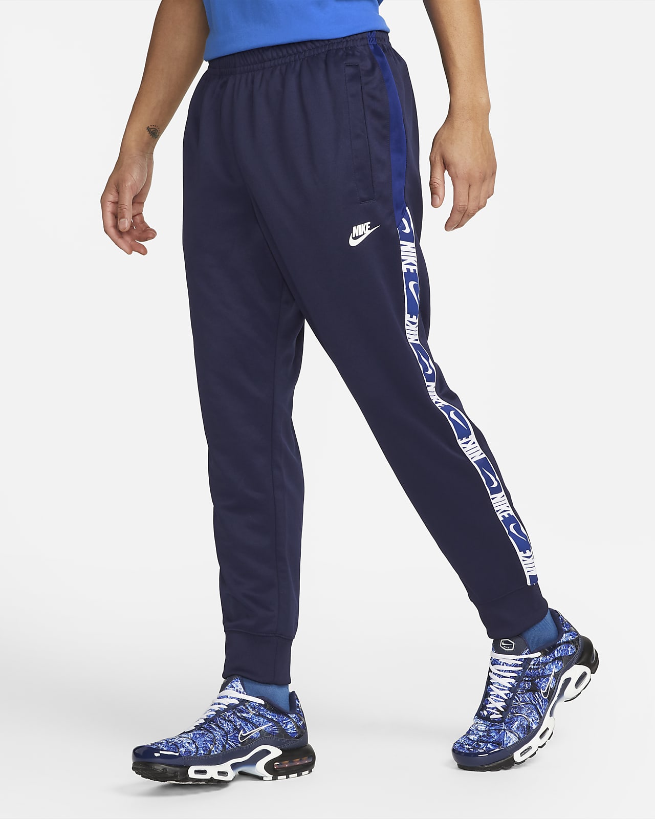 blue and white nike joggers