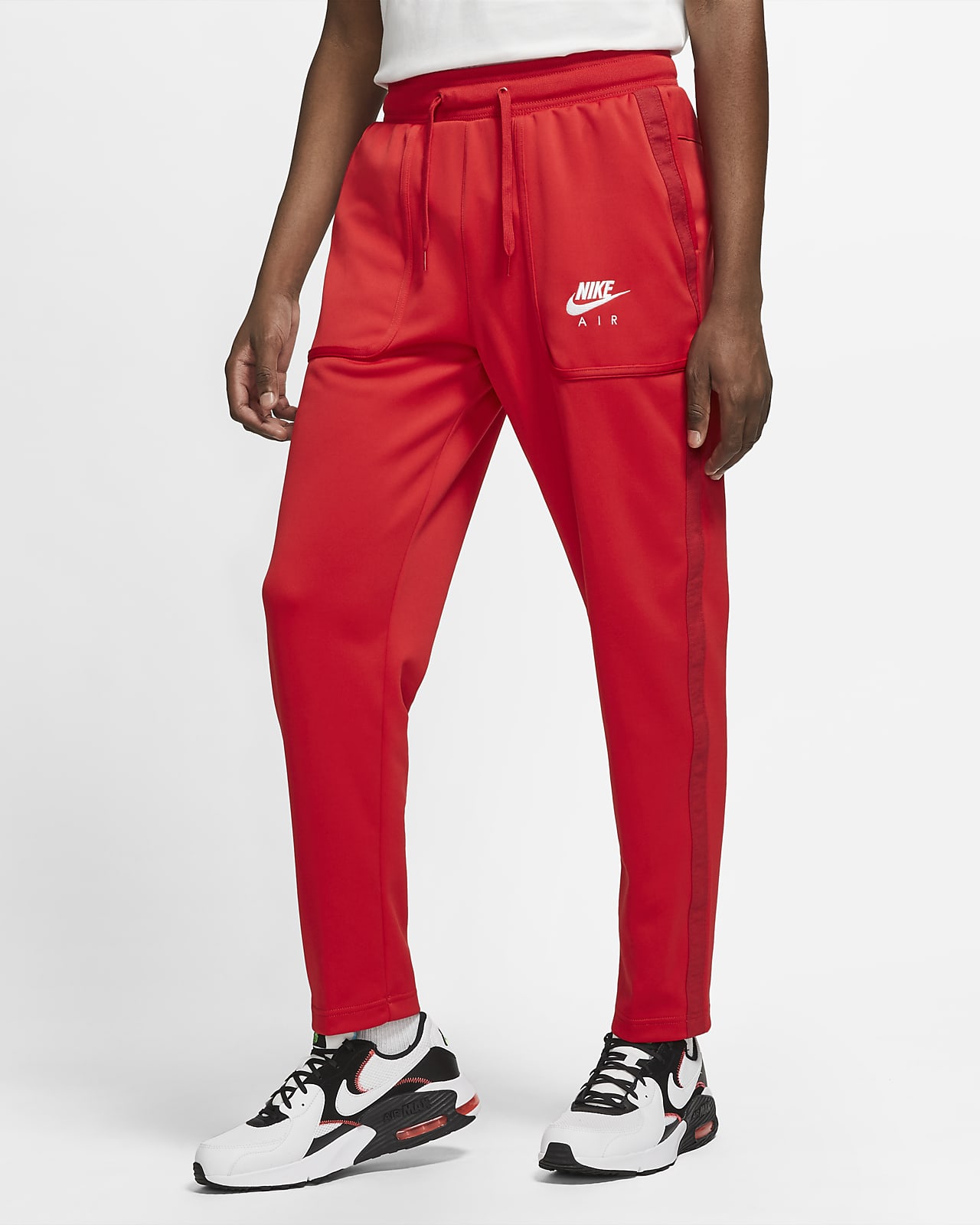 red nike trousers