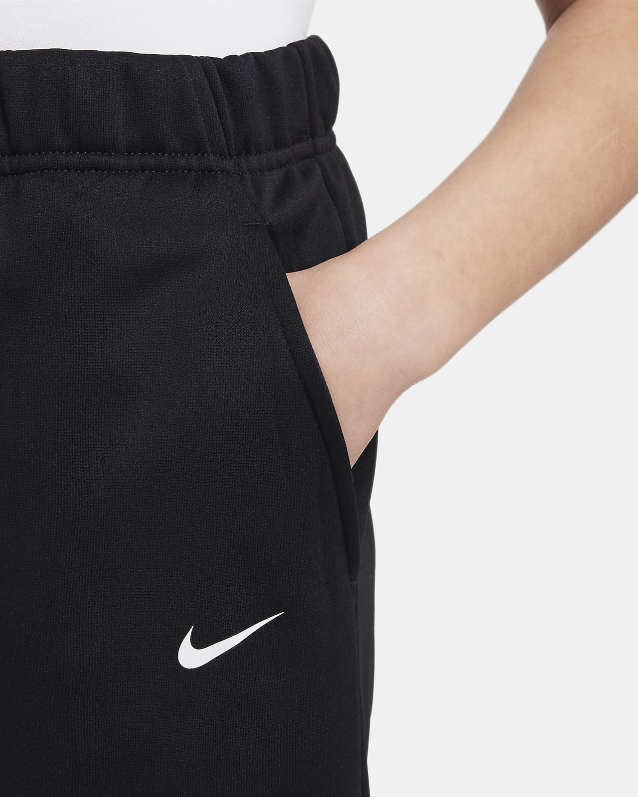 Nike Therma-FIT Older Kids' (Girls') Cuffed Trousers. Nike AE
