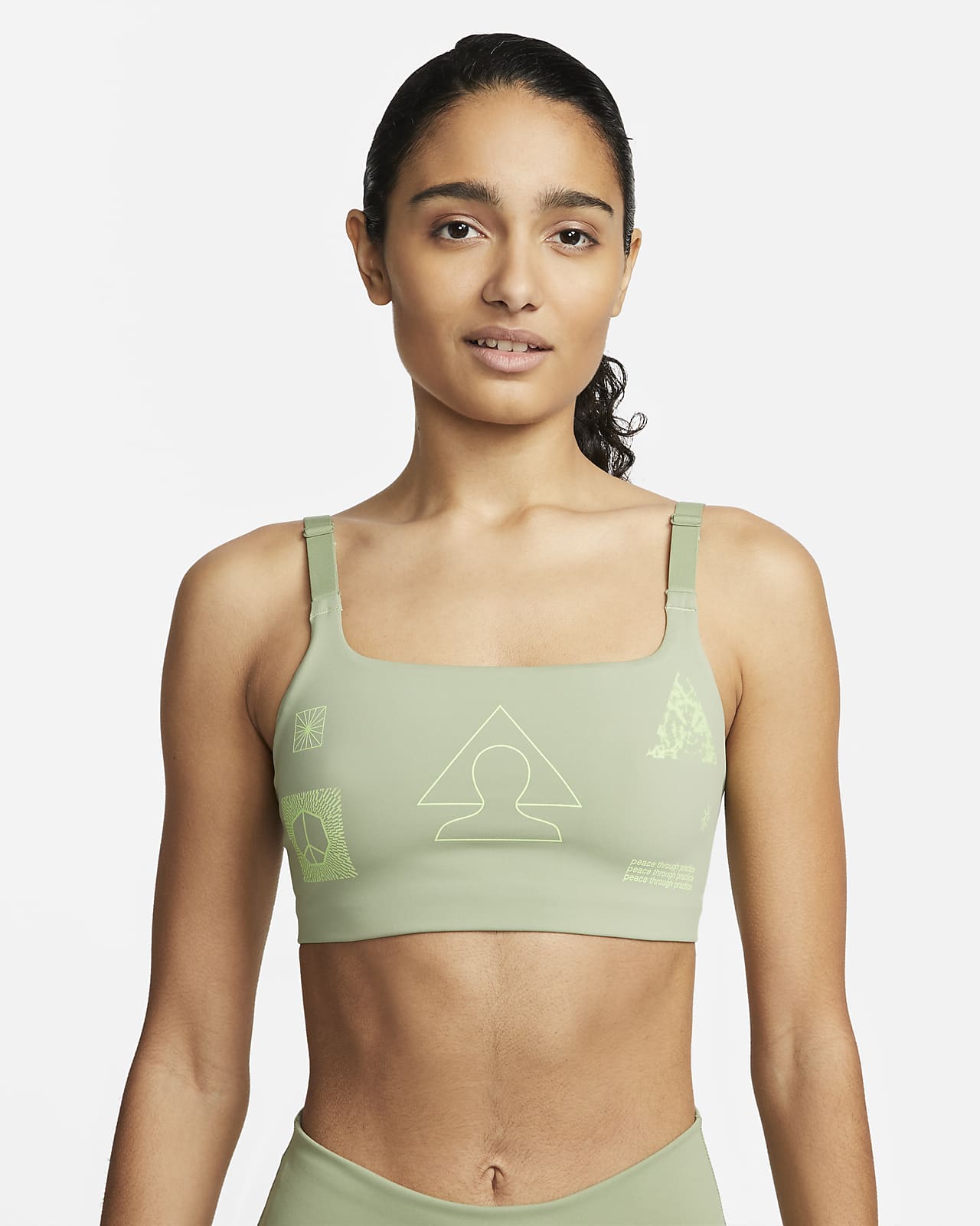 Nike Yoga Dri-FIT Indy sports-BH uten polstring med grafikk og middels støtte til dame