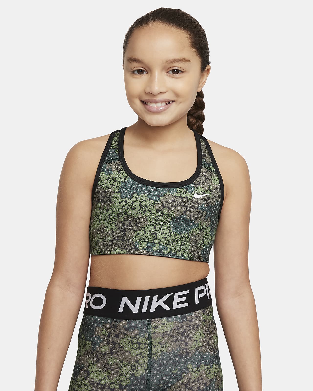 Brassière de sport réversible imprimée Nike Dri-FIT Swoosh pour Fille plus âgée