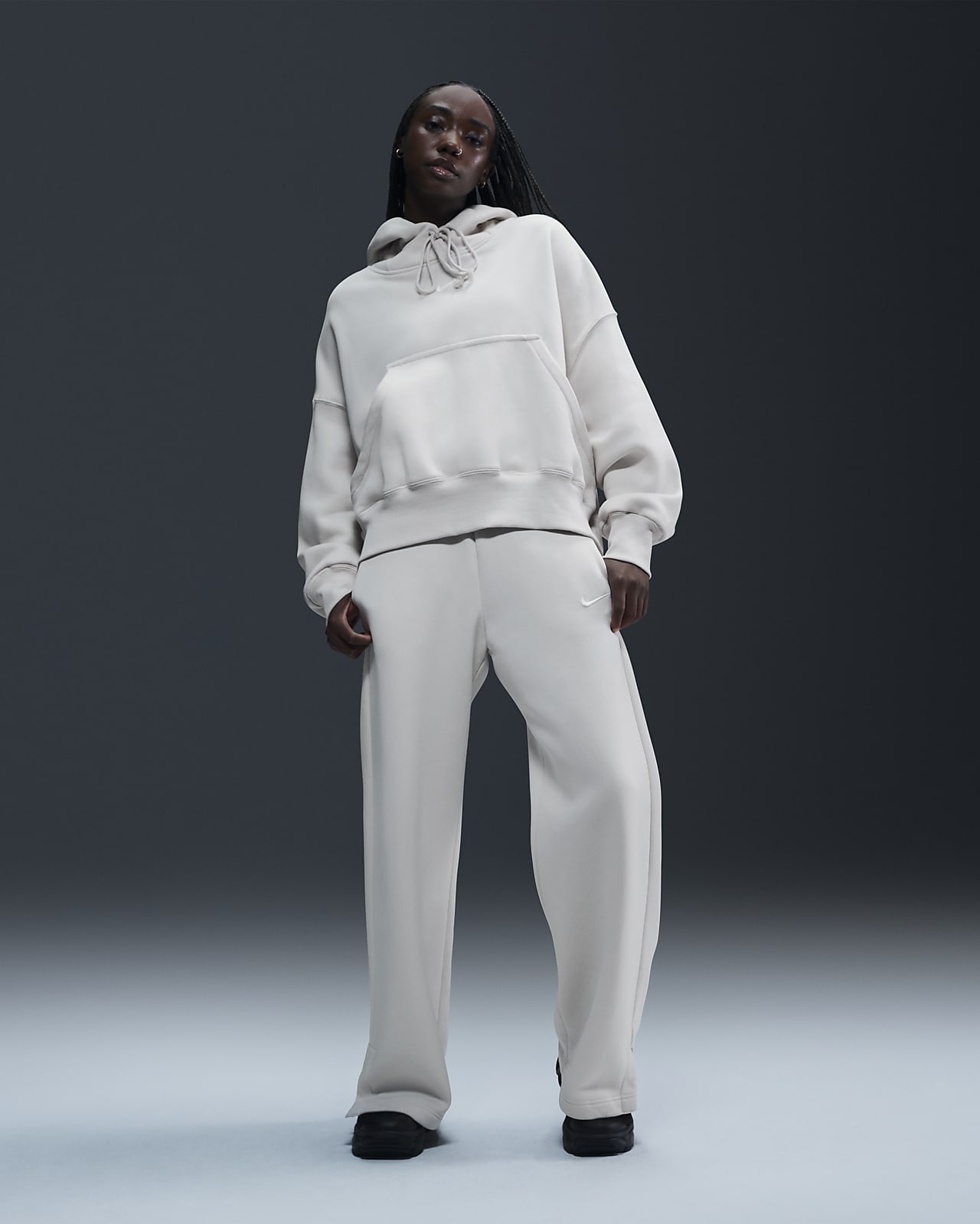 Damskie spodnie dresowe z wysokim stanem i szerokimi nogawkami Nike Sportswear Phoenix Fleece