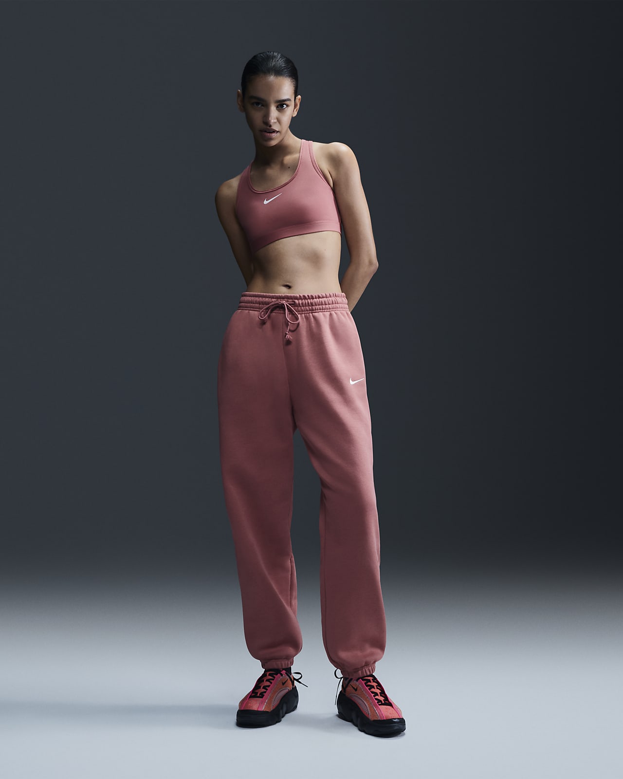 Pants de entrenamiento oversized de tiro alto para mujer Nike Sportswear Phoenix Fleece
