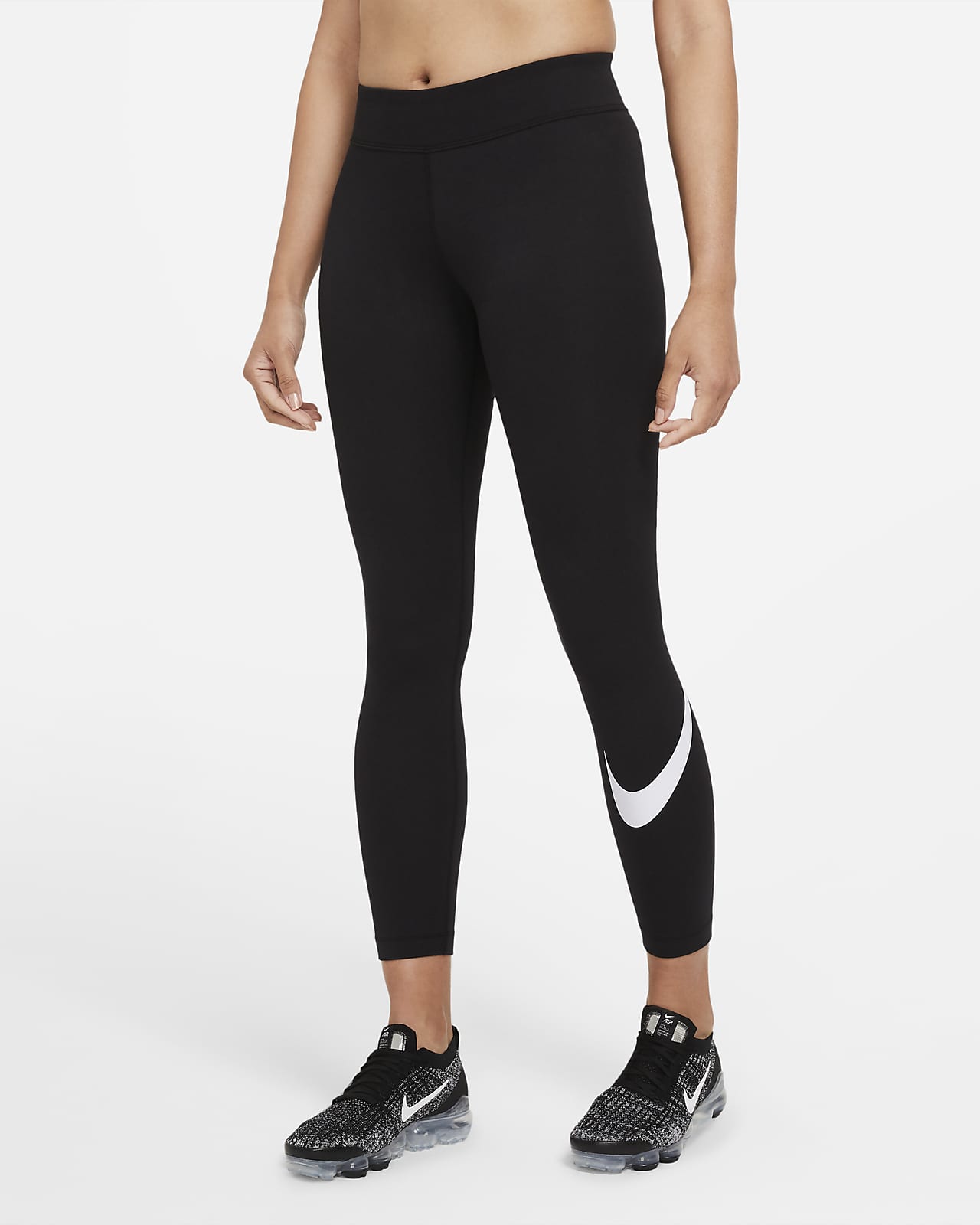 เลกกิ้งเอวปานกลางลาย Swoosh ผู้หญิง Nike Sportswear Essential