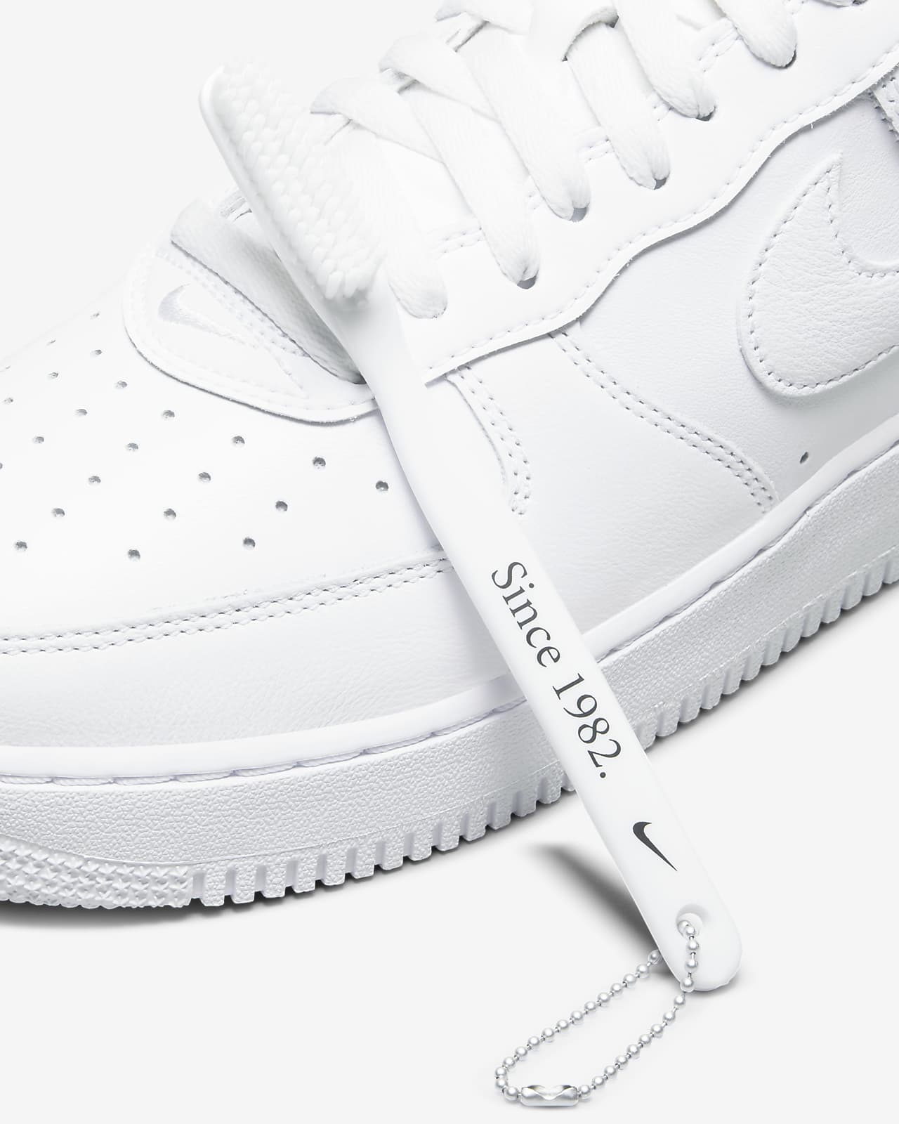Nike Air Force 1 Low Retro in White & Metallic Silver