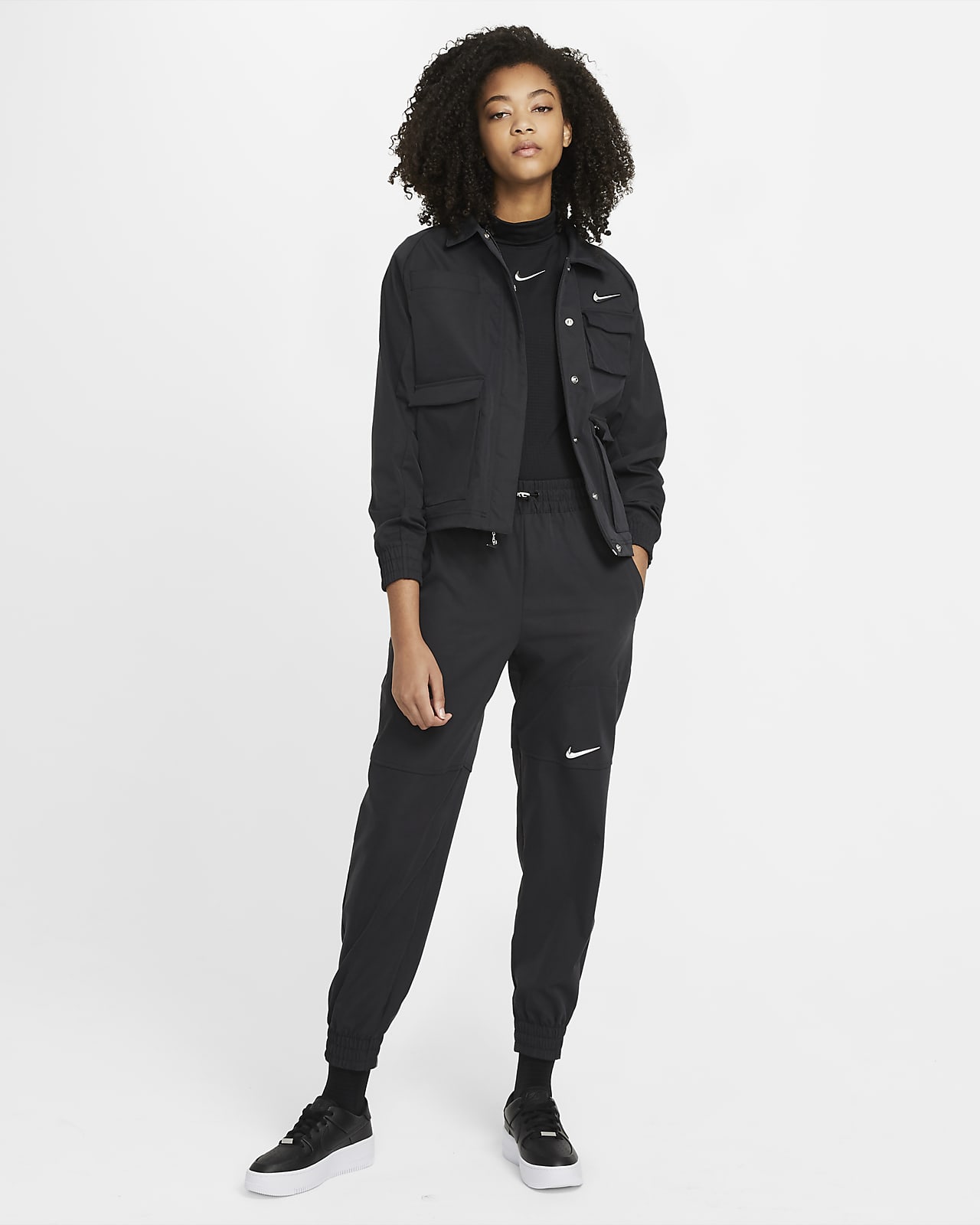 Pantaloni woven Nike Sportswear Swoosh - Donna. Nike IT