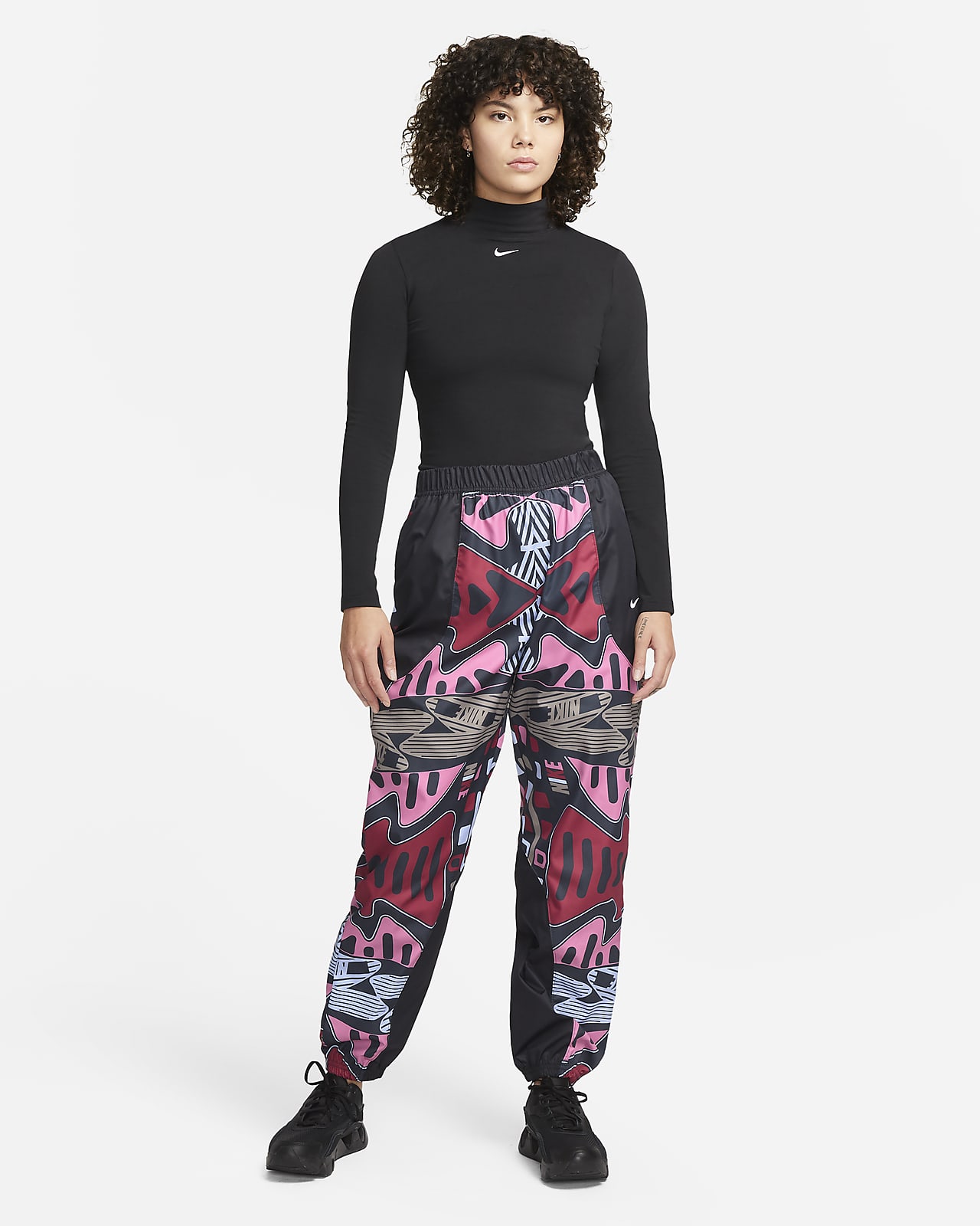 Pantaloni jogger a vita alta in tessuto Nike Sportswear - Donna. Nike IT