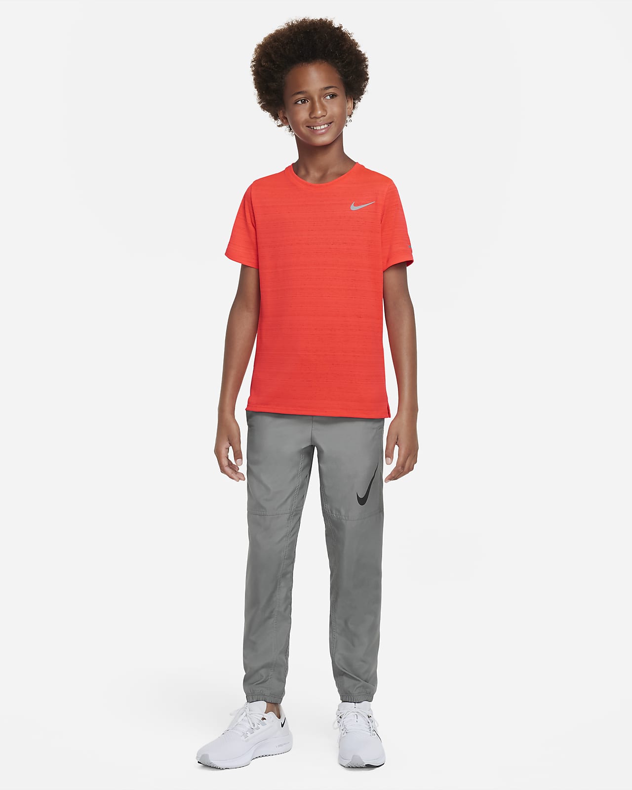Nike Dri-FIT Miler Trainingstop voor jongens. Nike NL