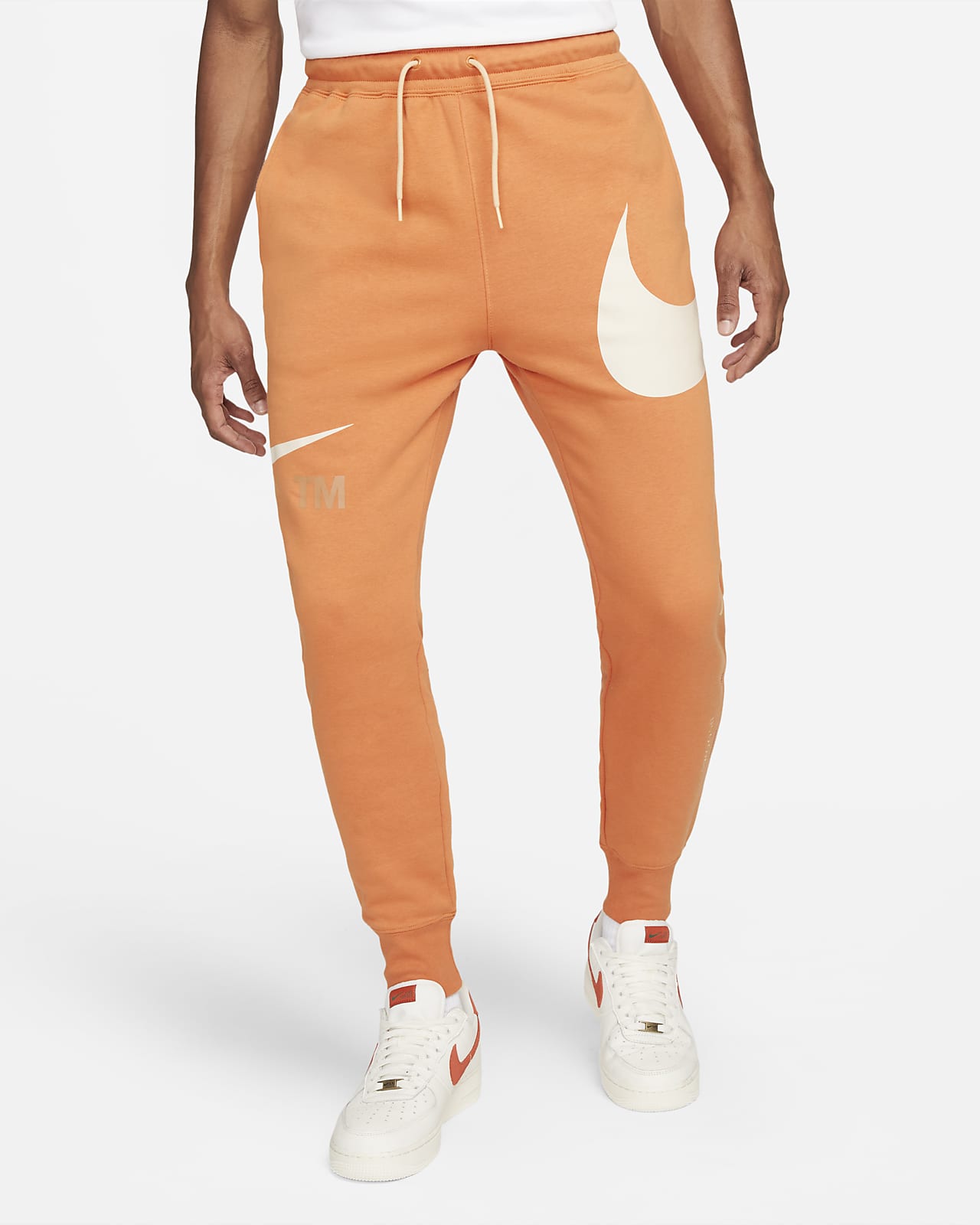 Męskie spodnie z materiału częściowo szczotkowanego od spodu Nike Sportswear Swoosh