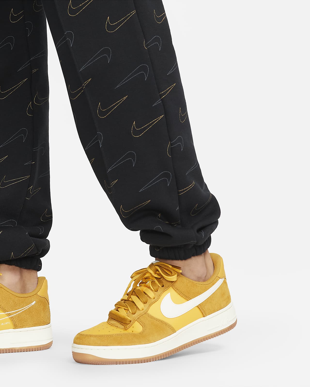 Pantaloni metallizzati in fleece Nike Sportswear - Donna. Nike IT