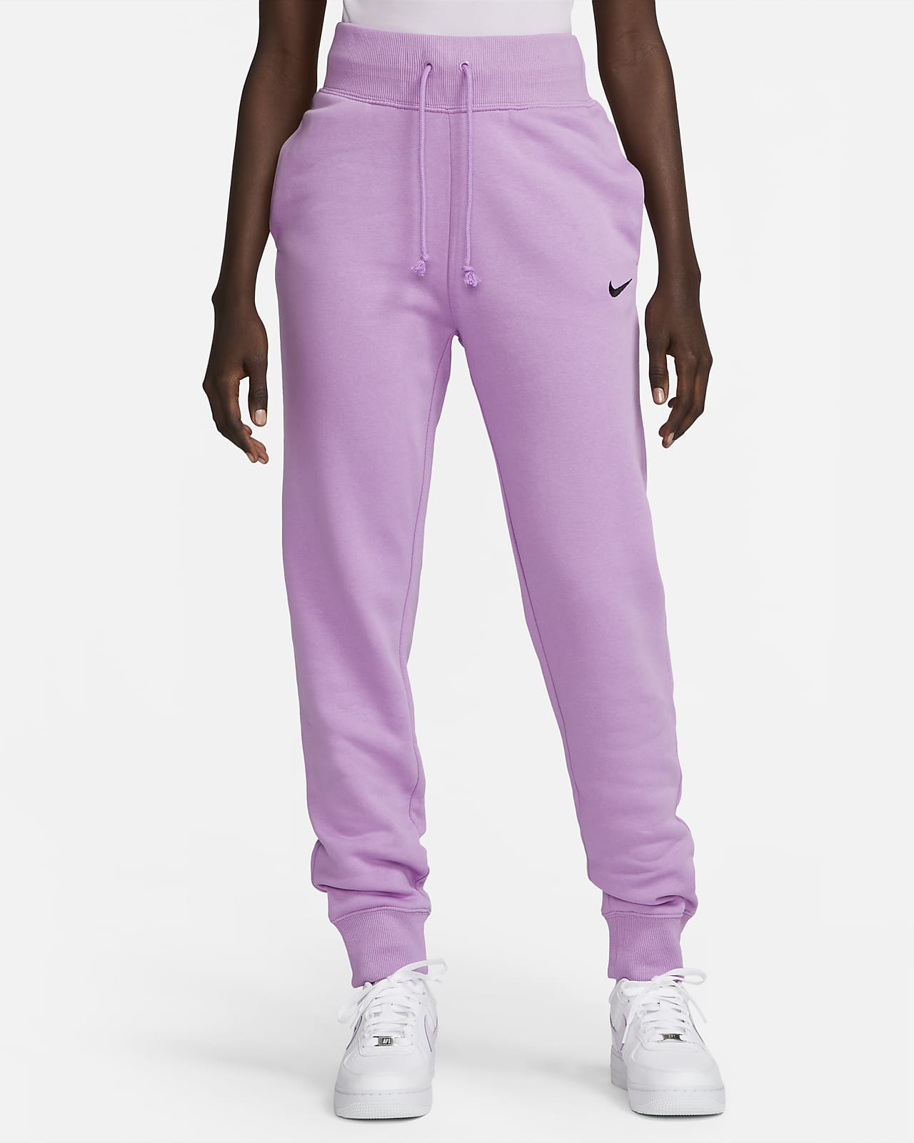 Joggers tejido Fleece de tiro alto para mujer Nike Sportswear Phoenix Fleece. Nike.com