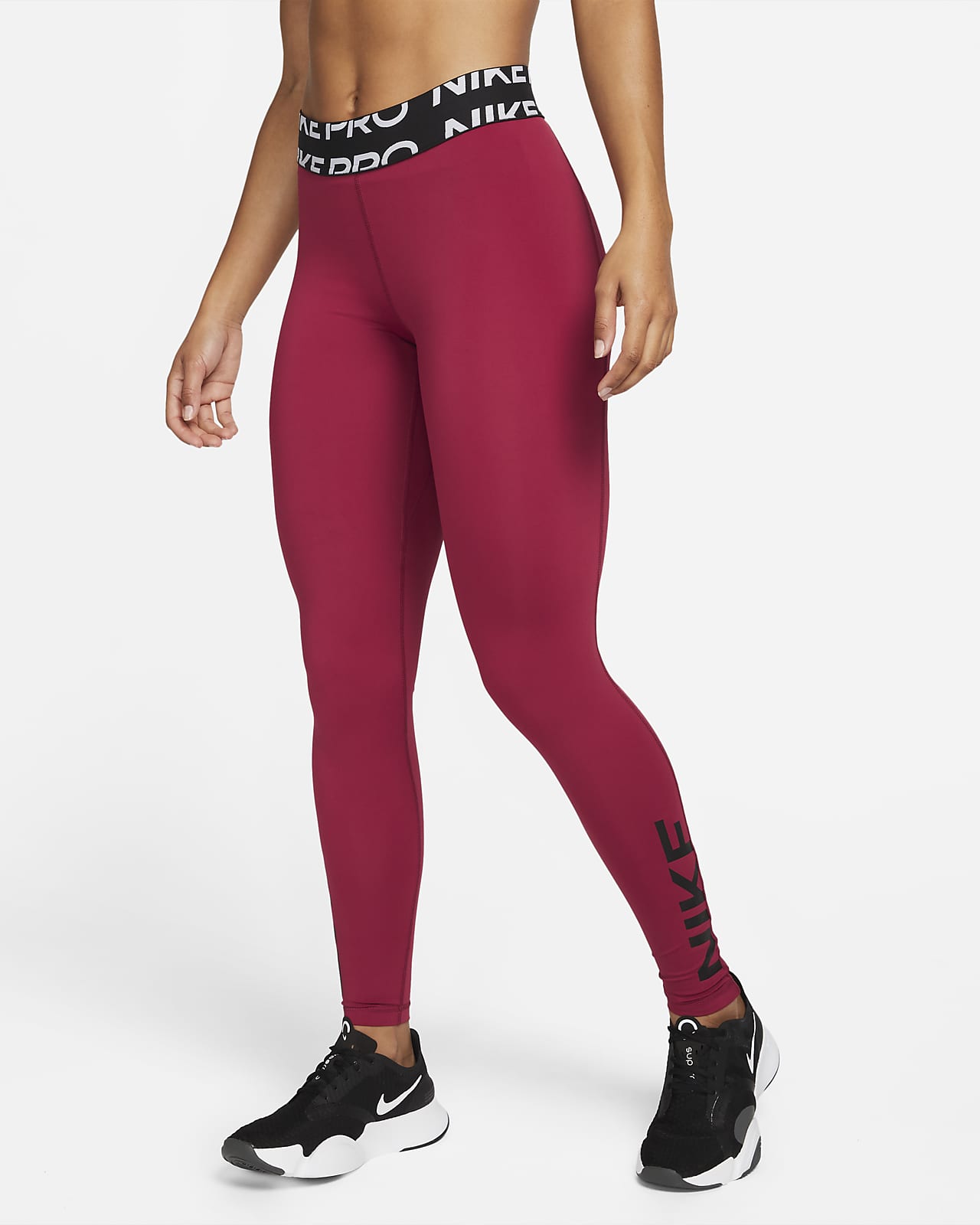 Nike Pro Dri-FIT Legging met halfhoge taille en graphic voor dames. Nike BE