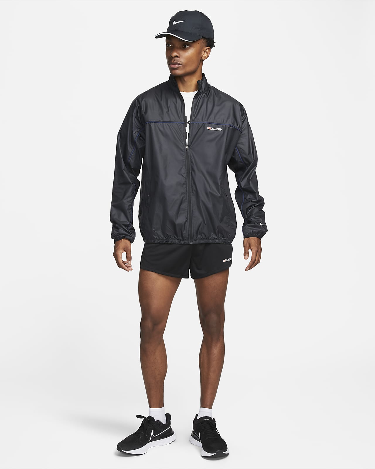 Nike Track Club Men's Storm-FIT Running Jacket.