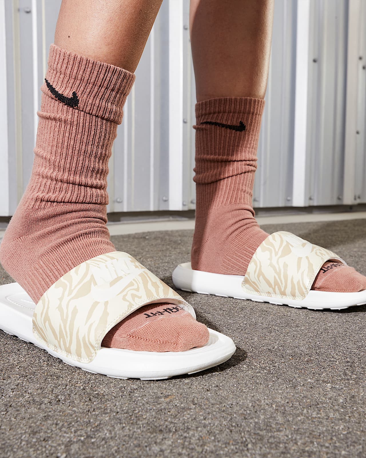 socks and nike slides